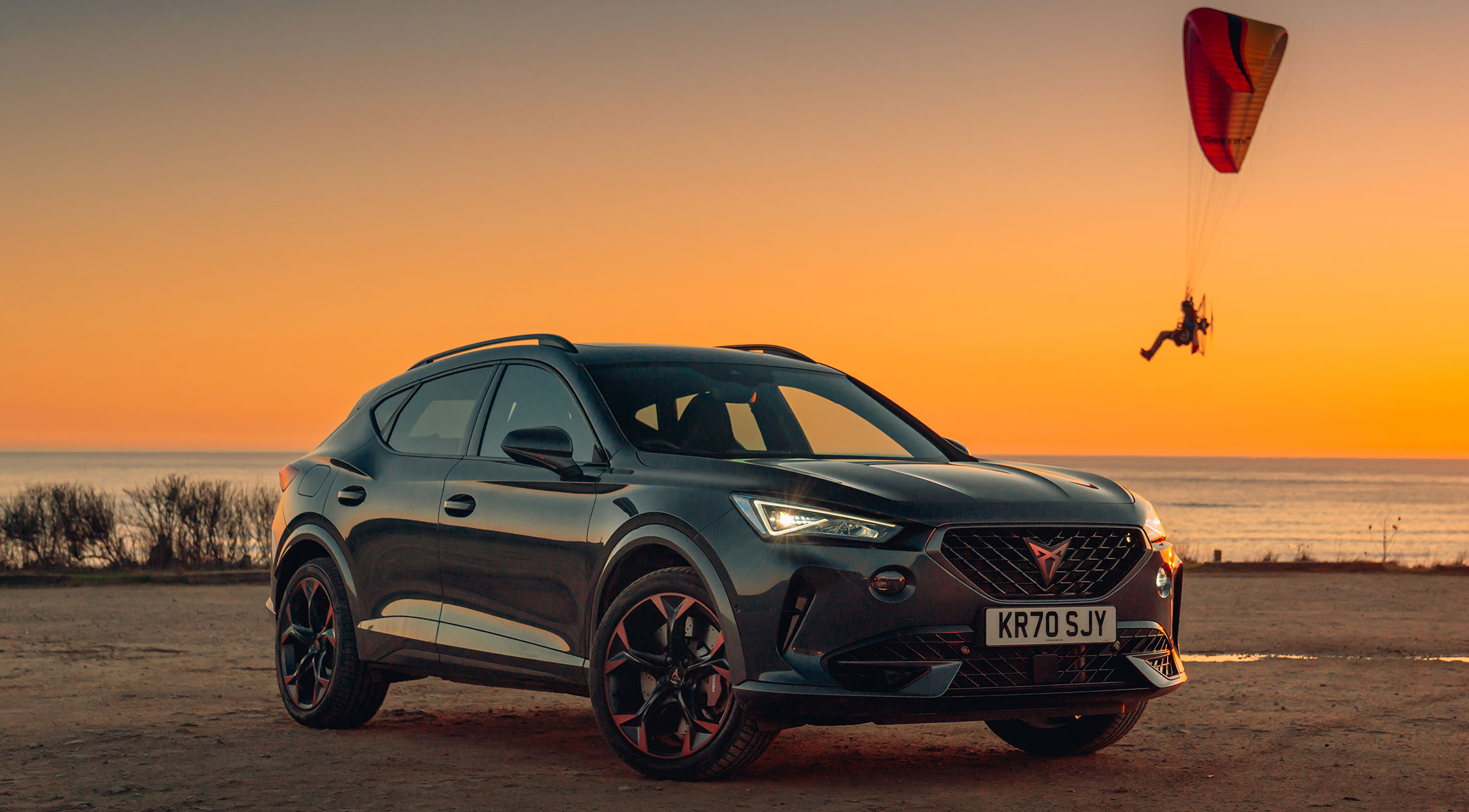 A CUPRA Formentor by a beach