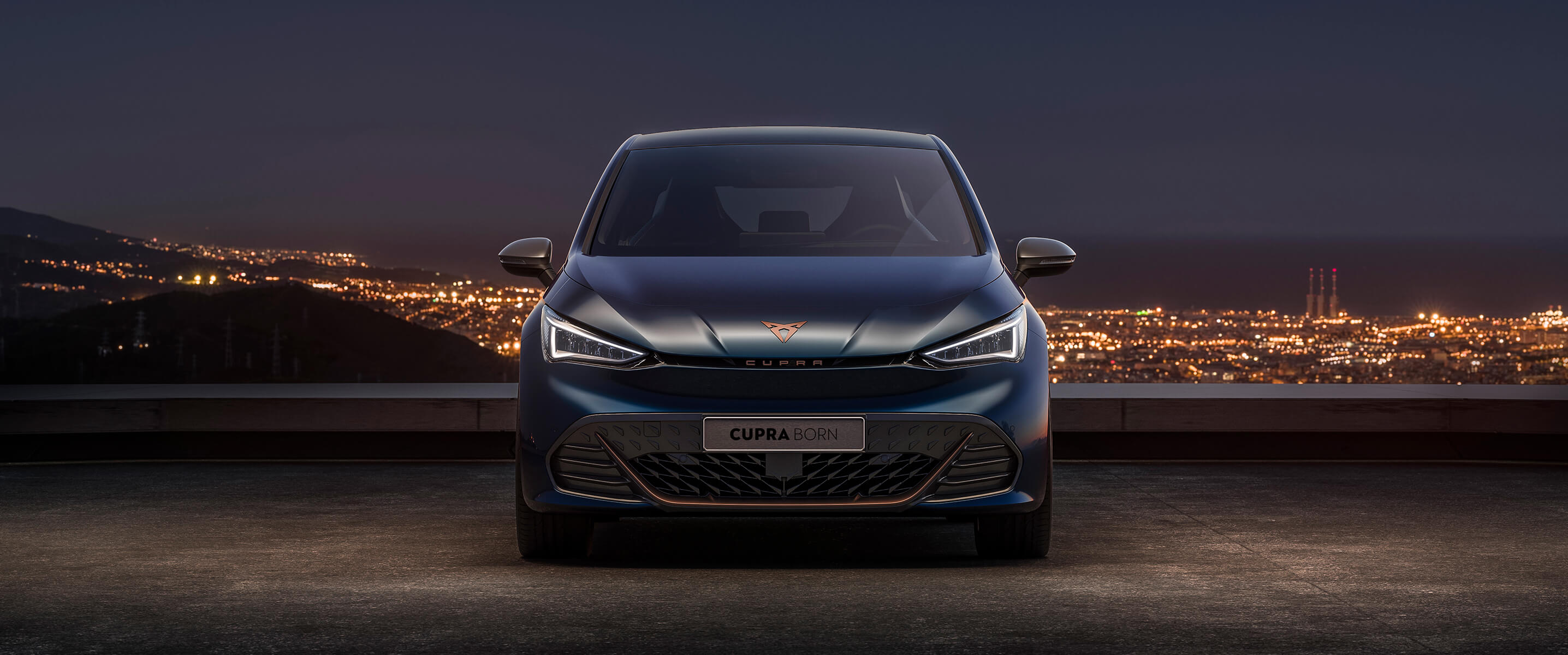 Front view of a CUPRA Born at night