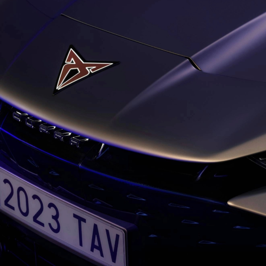 Close-up of CUPRA Tavascan bonnet with badge, and headlight