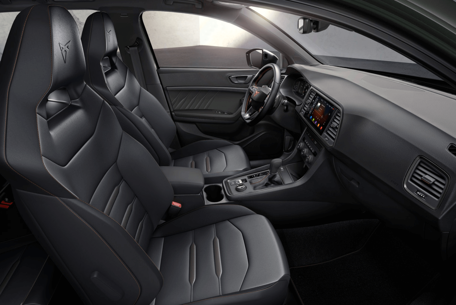 Interior view of the CUPRA Ateca with genuine Black Leather sporty Bucket seats, offering a polished and sophisticated look to enhance your driving experience.