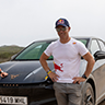 sebastien loeb standing in front of cupra tavascan 2024 