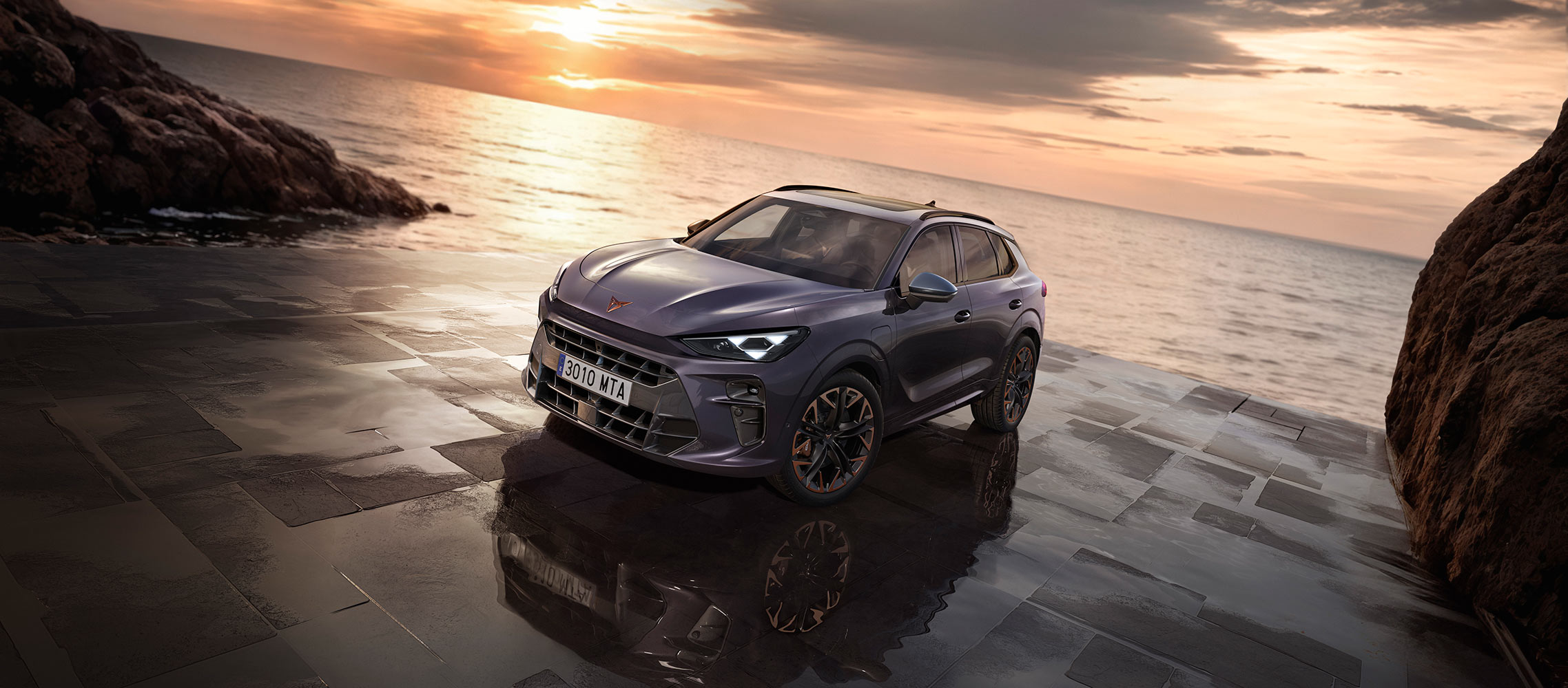 cupra terramar hybrid suv, new 2024 model, front view, featuring sleek headlights, modern alloy wheels, and a shark-inspired front design, on a wet pavement by the sea at sunset